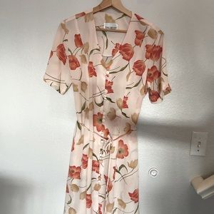 Floral dress with fabric buttons